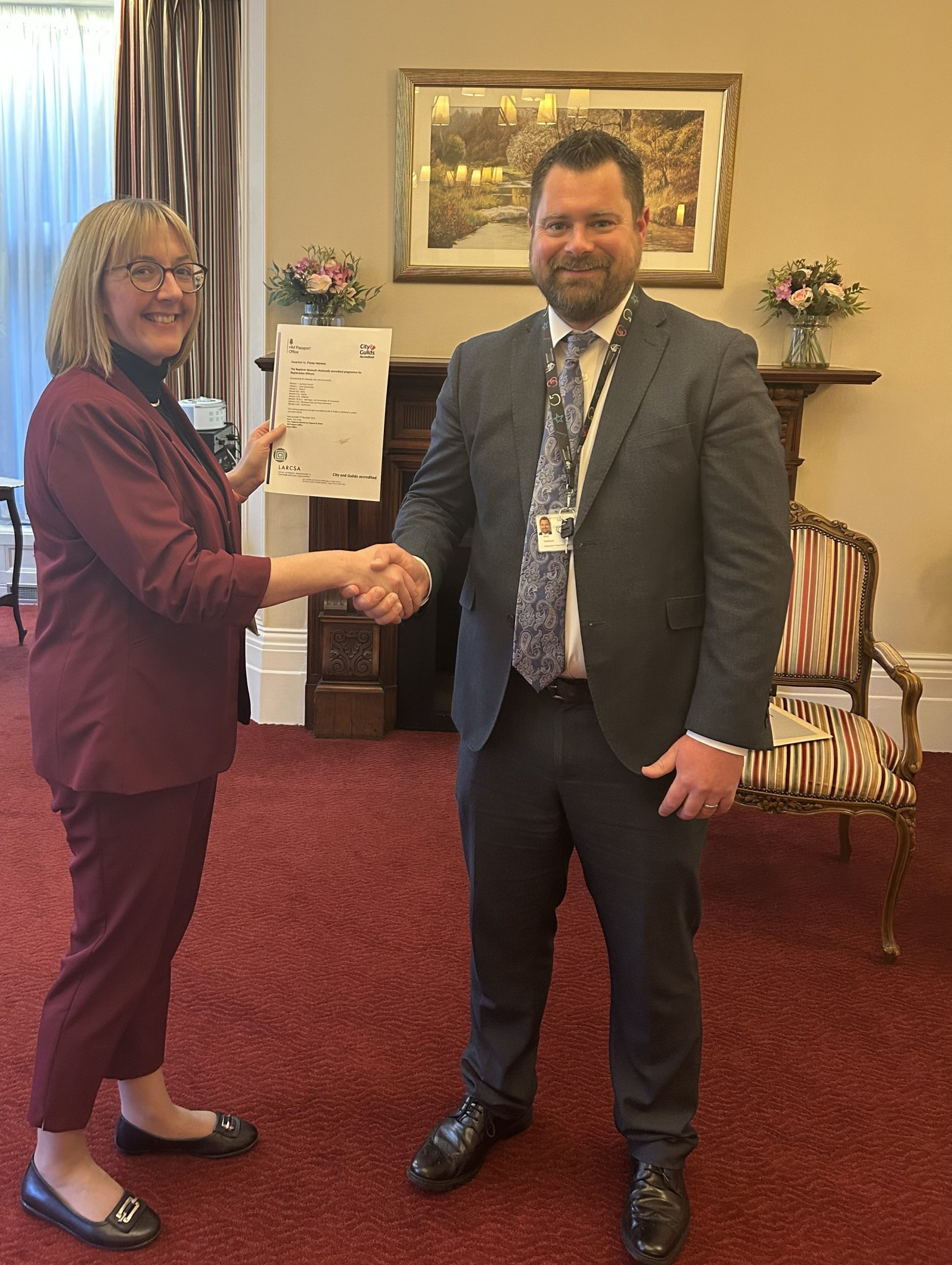 Fiona Heirene being presented with NAP certificate by Proper Officer for Newport, Mike Wallbank